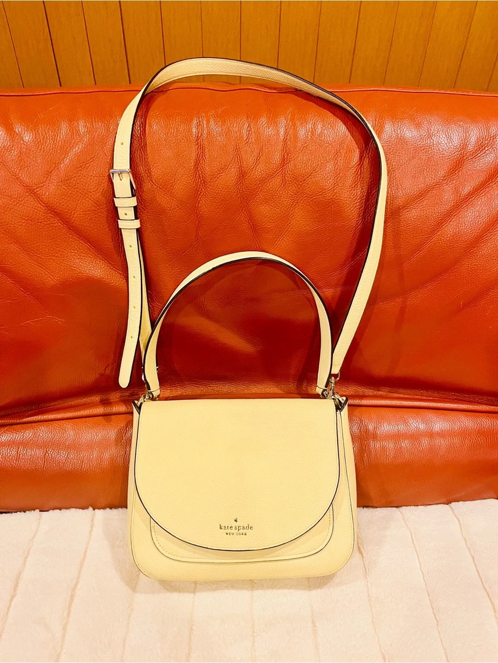 kate spade lemon cream leather saddle shoulder bag